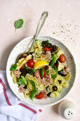 Pasta salad with tuna and vegetables. Top view with copy space.