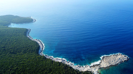 Fototapeta na wymiar Aerial drone top view photo of exotic paradise beach of Emblisi with turquoise and emerald clear sea near iconic Fiskardo bay, Cefalonia island, Ionian, Greece