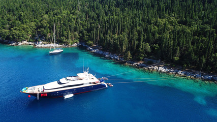 Fototapeta na wymiar Aerial drone photo of picturesque and iconic port of Fiskardo with luxury boats docked and traditional character, Cefalonia island, Ionian, Greece