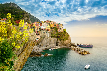 Manarola, Cinque Terre - romantic village with colorful houses on cliff over sea in Cinque Terre National Park