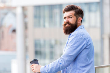 Start up concept. energy charge. Male barber care. copy space. thoughtful man drink take away coffee outdoor. morning coffee. Mature hipster with beard. Bearded man. brutal hipster with coffee cup