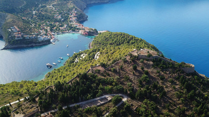 Fototapeta na wymiar Aerial drone bird's eye view photo of beautiful and picturesque colorful traditional fishing village of Assos in island of Cefalonia, Ionian, Greece