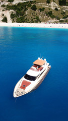 Aerial drone photo of large yacht - boat docked in tropical exotic paradise bay with emerald open...