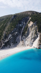 Aerial drone photo of iconic turquoise and sapphire bay and beach of Myrtos, Cefalonia island, Ionian, Greece