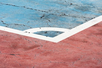 Old arena of white lines and color is crack on cement floor stadium, futsal competition.