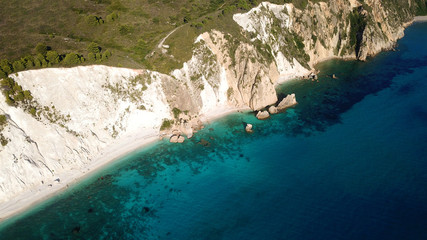 Aerial drone photo of iconic white rock cliffs and volcanic formations near famous beach of Platys and Makrys gialos with turquoise clear sea, Argostoli, Cefalonia island, Ionian, Greece