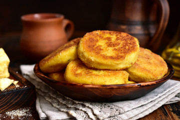 Fried potato patties with cheese.
