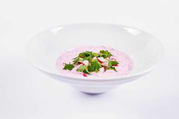 Cold borscht (chlodnik) - traditional Lithuanian cold soup with radish, parsley and dill