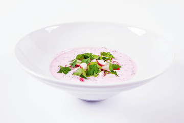 Cold borscht (chlodnik) - traditional Lithuanian cold soup with radish, parsley and dill
