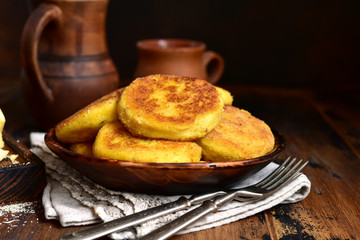 Fried potato patties with cheese.
