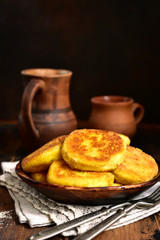 Fried potato patties with cheese.