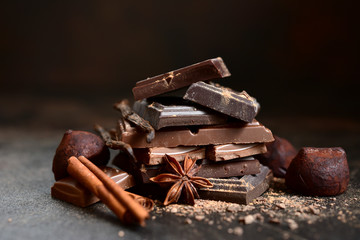 Stack of chocolate slices with spices.