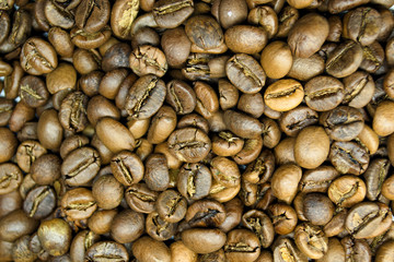 roasted coffee beans on white background
