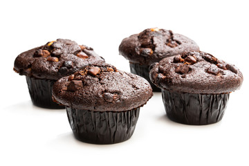Triple chocolate muffins isolated on white