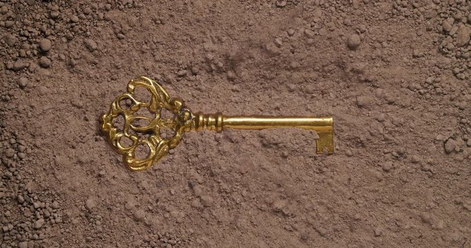 Finding an old gold skeleton key - Discovering success concept