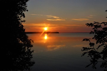 Obraz na płótnie Canvas Sunset over Manitoba lake