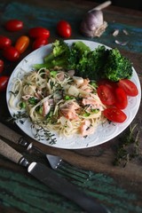 Spaghetti with salmon and vegetables - 283417350