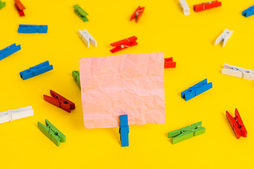 Colored clothespin papers empty reminder yellow floor background office