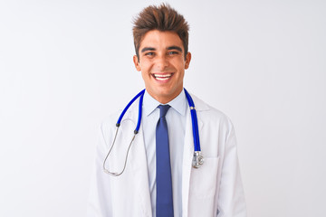 Fototapeta premium Young handsome doctor man wearing stethoscope over isolated white background with a happy and cool smile on face. Lucky person.
