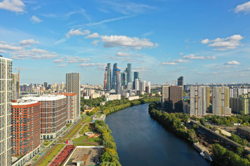 Fototapeta na wymiar Moscow, Russia. Aerial view of Moscow business center skyscrapers, Moscow River and modern residential buildings