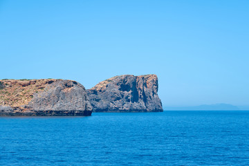 Fototapeta na wymiar Rocky islands of Crete, Greece. Copy space. 