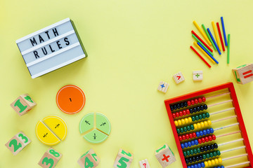 Creative Сolorful light box, fractions on yellow background. Interesting funny math for kids....
