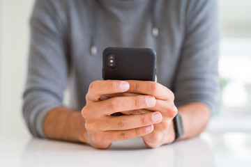 Close up of man using smartphone