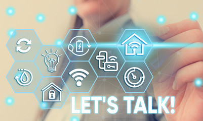 Conceptual hand writing showing Let S Talk. Concept meaning they are suggesting beginning...