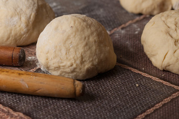 Woman making dought.Dought for pizza and bread.Food