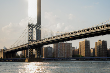 Manhattan Bridge with sun reflection