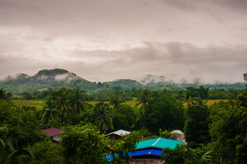 Fototapeta na wymiar Rain clouds that form near the village