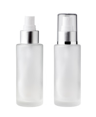 Glass bottle with white spray nozzle isolated on white background