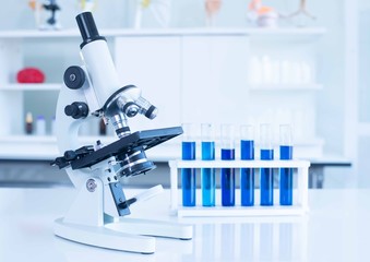 Microscopes and scientific test tubes in the laboratory.