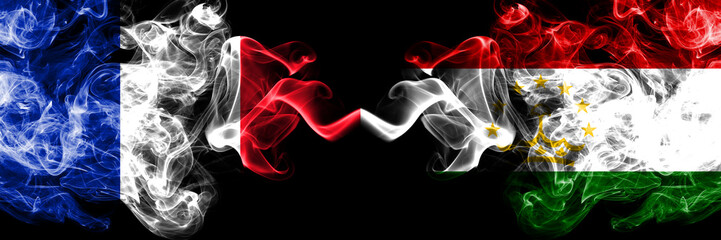 France vs Tajikistan, Tajikistani smoky mystic flags placed side by side. Thick colored silky...