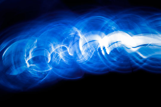 Sound waves in the dark in blue color