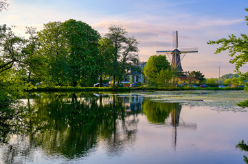 Fototapeta na wymiar Historic windmills located in Kralingen Lake in Rotterdam, the Netherlands.