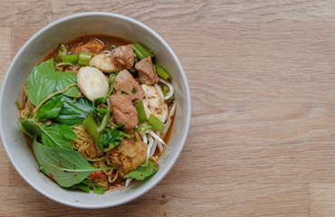 thai noodle soup with meat and vegetables