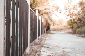 Blurred of Fence and road on  natural background