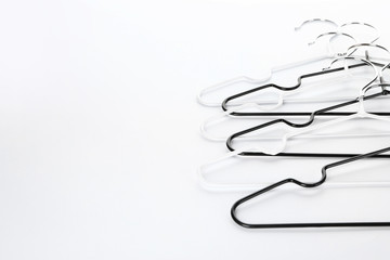 Clothes hangers on white background