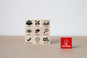 Strategy and planning graphic  icons for Business success on wooden blocks