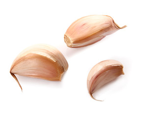 Fresh garlic cloves on white background