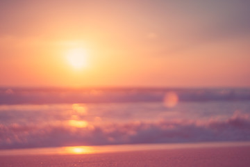 Fototapeta premium Copy space of soft sand sea and blur tropical beach with sunset sky and cloud abstract background.
