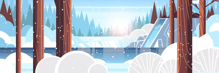 beautiful waterfall over rocky cliff snowy winter forest nature landscape sunset background flat horizontal