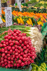 Radishes, scallions and other vegetables for sale