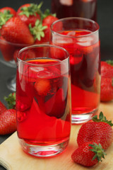 Glasses with strawberry drink with ice	