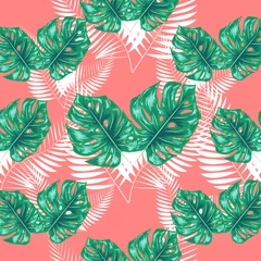 Tropical leaf design featuring navy Palm and blue Monstera plant leaves on a pink background. Seamless pattern. © MichiruKayo