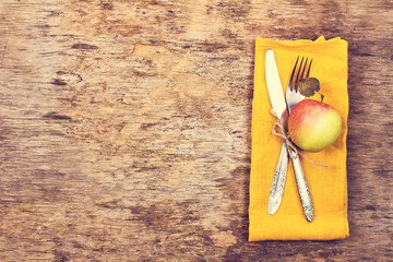 Fork, knife, napkin, cutlery.