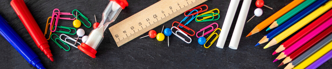  Back to school Background. School supplies on black chalk board. Flat lay