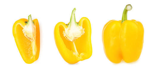 Ripe yellow bell peppers on white background