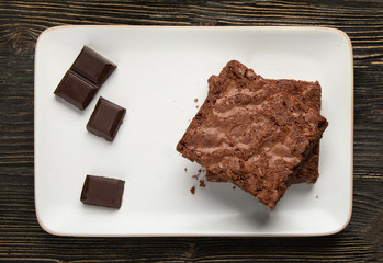 Chocolate brownie cake served on rectangle plate